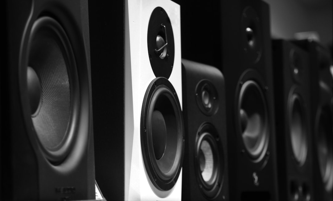 The image shows a row of separate speakers.